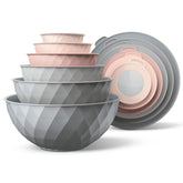 Cook With Color mixing bowls stacked neatly for space-saving storage.