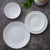 Corelle White Winter Frost plate close-up highlighting durable Vitrelle glass for daily use