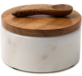 Cork & Mill white marble salt cellar with acacia lid keeps seasonings dry.