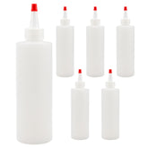 Cornucopia Brands 8oz squeeze bottle with red yorker tip for precise dispensing.
