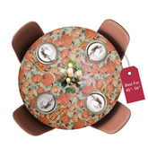 Covers For The Home pumpkin-pattern round table cover protects surfaces from spills