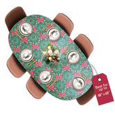 Covers For The Home Holly-pattern round table cover, close-up view showing the protective vinyl surface