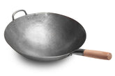 Craft Wok Big 16 Inch hammered carbon steel round bottom close-up for high-heat searing.