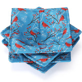 Cunhill bird-pattern teal bowl holder in use for hot bowls