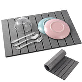 Cuomaop stone drying mat on kitchen counter showing quick-dry function.