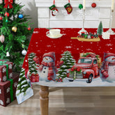 Cusugbaso Christmas tablecloth with snowman and truck design on 52x70 inches for festive gatherings.