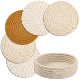 Dakartoon trivets protect surfaces under hot dishes on a wooden counter.