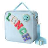 Dark Swan insulated lunch bag blue front view with smiley design, easy to carry