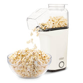 DASH Fresh Pop popcorn maker front view on a clean counter, showing compact design.