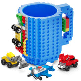 DAYMOO Build-on Brick Mug displays car and plane models on blue mug for playful mornings