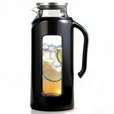 Delove glass pitcher with handle and spout for easy pouring and serving iced drinks.