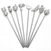 Demigo fruit-shaped picks with pineapple topper for tropical cocktails and garnishes.