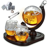 Desired Cart whiskey decanter globe set with etched glasses enhances a refined home bar.
