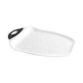 Dexas Chop & Scoop with curved edges guiding chopped produce into a pan