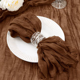 DeZerlor brown cheesecloth napkins with wrinkled texture for rustic table decor