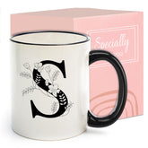 DHQH monogram mug with initial S, marble finish, ideal for daily coffee rituals.