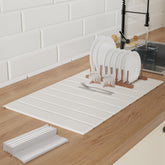 Ditother stone drying mat on kitchen counter showing quick moisture absorption