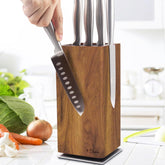 Dmore knife block with acacia wood stand showing elegant counter organization.