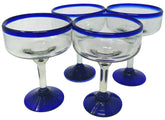 Dos Sueños margarita glasses set of four, hand-blown with cobalt rim, ideal for entertaining.
