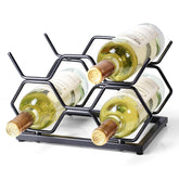 Drincarier countertop wine rack displays five bottles with modern gold design.