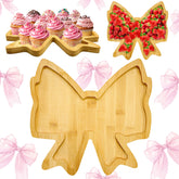Easma wooden bow charcuterie board showcased for elegant party display.