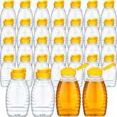 Eccliy clear honey jar with yellow cap for precise pouring.
