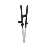 Edison Friends training chopsticks for adults in stainless steel, supporting a natural right-handed grip.
