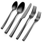 EIUBUIE matte black flatware knives on a dining table for upscale meals.