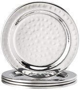 Elegance hammered 4-inch coaster collection on a table protects surfaces during drinks.