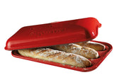 Emile Henry baguette baker with lid and dough rising for a light, crispy baguette.