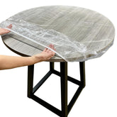 Evelots clear round table cover protects a 45-56 inch table while showcasing the surface
