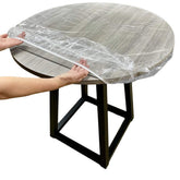 Evelots clear round table cover with elastic edge fits 36–42 inch tables and shields from spills.