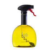 Evo Oil Sprayer bottle on counter for precise oil application.