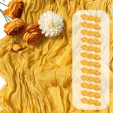 FANTEKE gold cheesecloth table runner 17x108 inches on a rectangular table, elevating the dining setup.