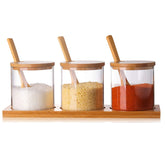FANTESTICRYAN 3-piece condiment canisters on bamboo tray keep spices organized and accessible.