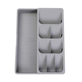 Faridabio silverware organizer top view showing expandable compartments for neat cutlery.