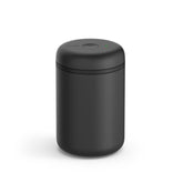 Fellow Atmos vacuum canister with airtight seal preserves aroma and freshness.