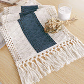FEXIA boho blue table runner with tassels on a dining table adds rustic charm.