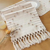 FEXIA boho table runner with tassels on a dining table for rustic charm
