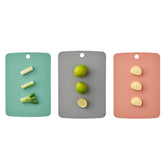 Firgi triple cutting-board set hero: versatile prep surfaces for vegetables, meats, and herbs.