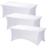 Fixwal white spandex table cover on a 6ft rectangle table for a neat, wrinkle-free presentation.