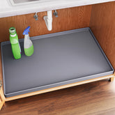 FLATO under-sink mat with cabinet-protector edge keeps cabinets dry and organized.