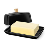 Flexzion butter dish with lid in black porcelain keeps butter fresh and protected.