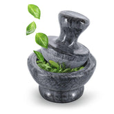 Flexzion marble mortar and pestle set in black for precise spice grinding.