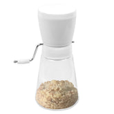 Fox Run 5716 hand crank nut chopper with glass bowl for quick chopping.