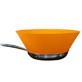 Frywall 12 orange splatter guard protecting the stovetop during frying.