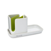 Full Circle Stash ceramic sink caddy keeps sponges neatly organized with a sleek finish.