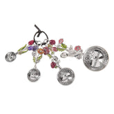 Ganz measuring spoons with a colorful flower bouquet design for precise portions.
