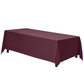 Gee Di Moda burgundy rectangle tablecloth for an 8-foot table with a luxurious look.