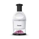 Geedel Food Chopper slicing onions quickly on the base for faster meal prep.